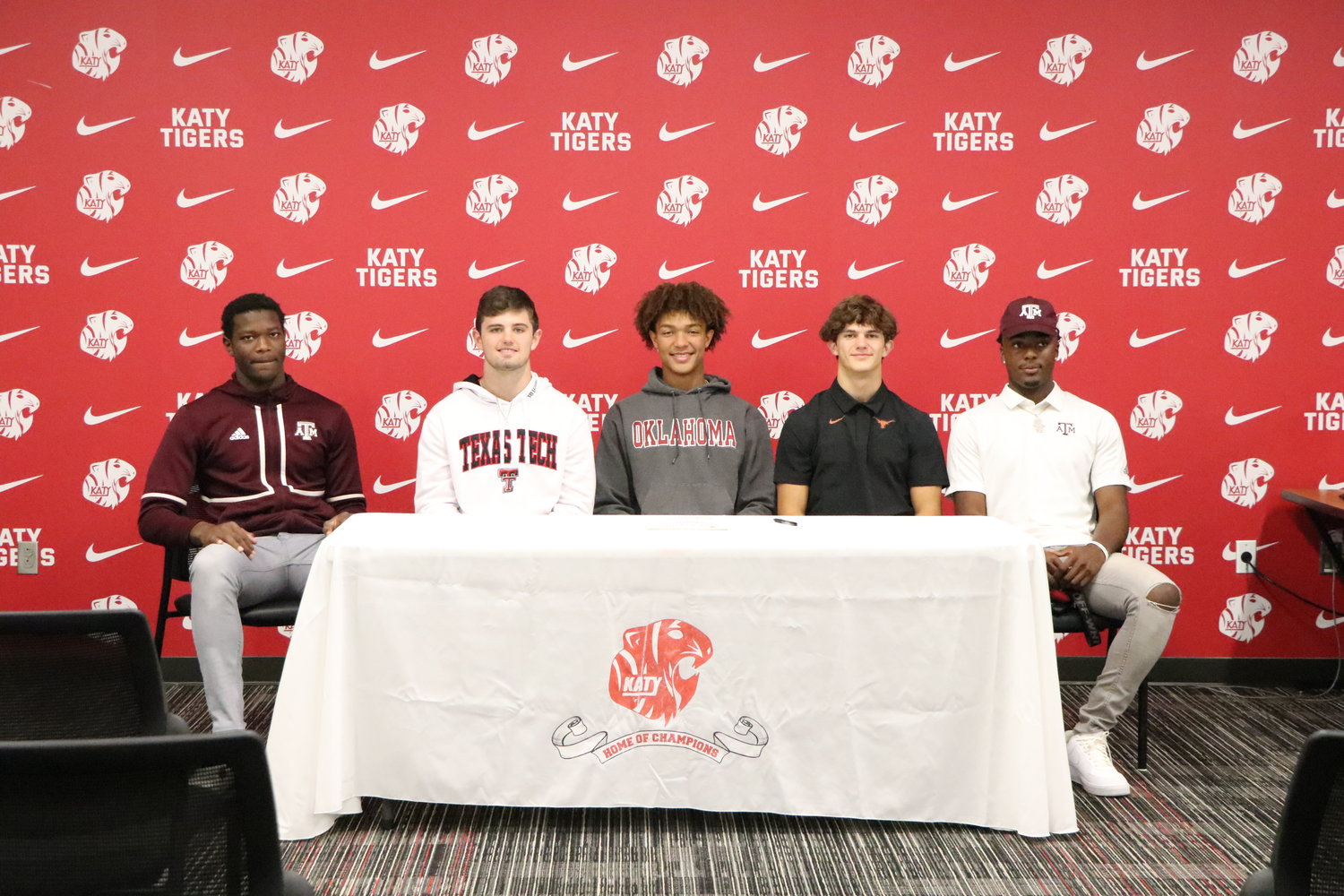 Malick Sylla, Ty Kana, Nic Anderson, Hamilton McMartin and Bobby Taylor wait to sign their national letters of intent.